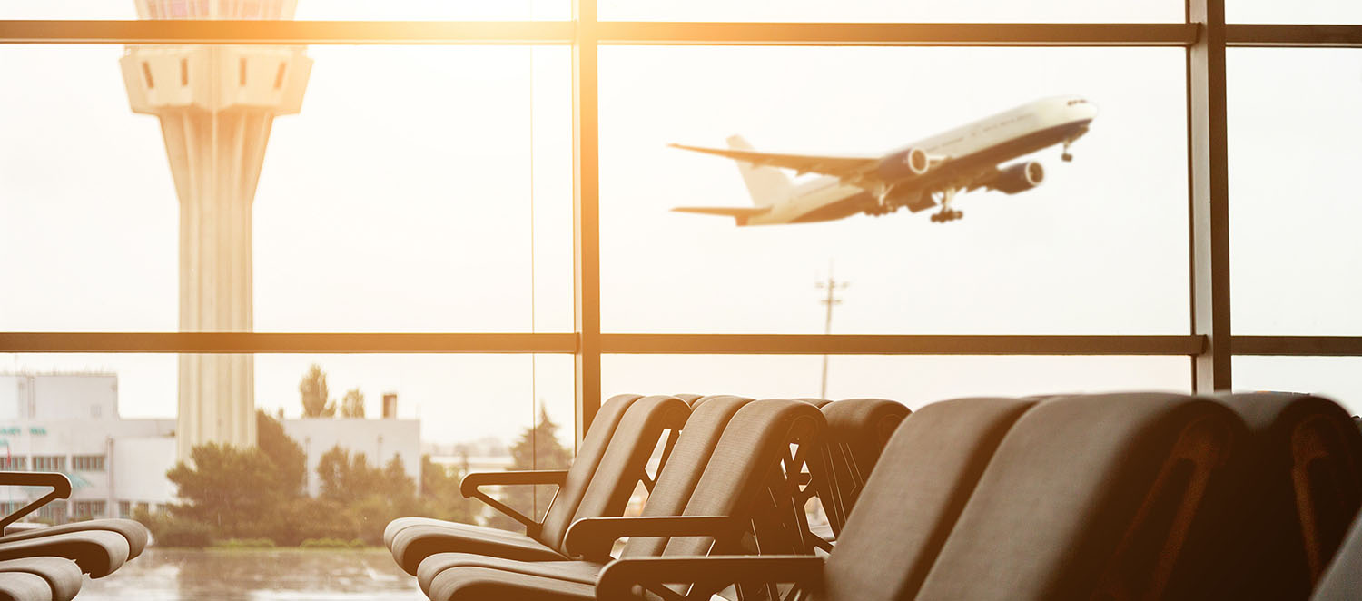 Viewing an airplane take off from the airport terminal