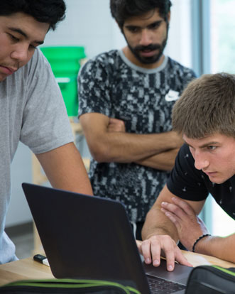 Cornell College students work on a project in the engineering department's fabrication lab