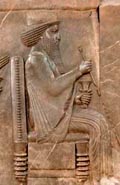 King Darius seated on a throne