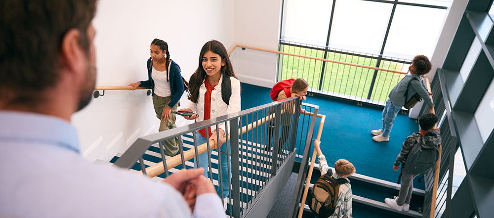 Cornell student works with elementary kids. 