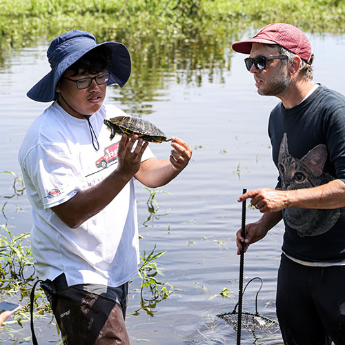 Students mapping earth geography in GIS lab