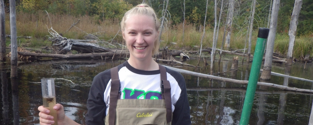 Environmental studies student in the water during a field course to the Boundary Waters in northern Minnesota.