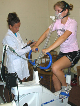 Students conduct physiology measurements during and exercise science class