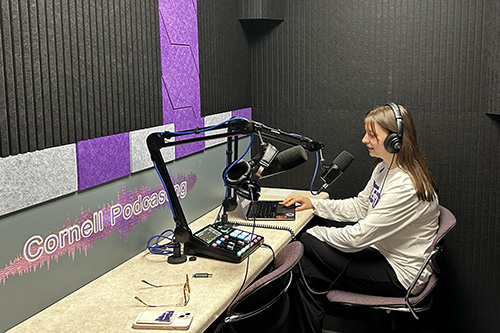 student in ats podcasting studio