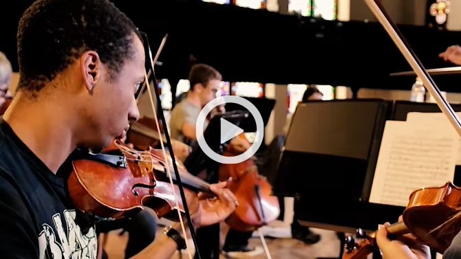 Screenshot of Cornell's Block Plan Success Video showing students playing musical instruments