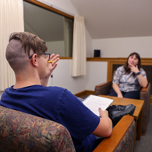 Students working together on a chemistry research experiment