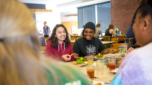 Students gather in the dining hall on the campus of Cornell College in Mount Vernon, Iowa. 