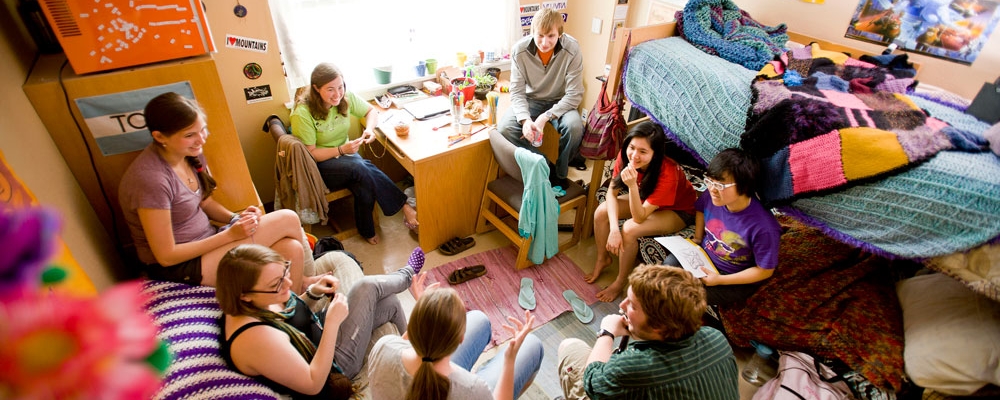 Students gather in a res hall room