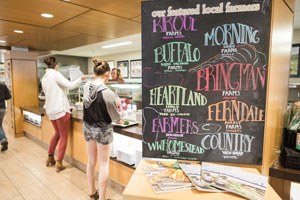 Cornell students get meals inside the Hilltop Cafe, Cornell's dining hall
