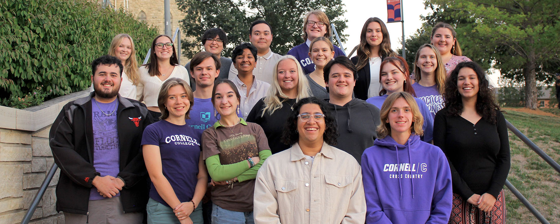 Cornell College Student Senate members sit on the steps outside of Thomas Commons. 