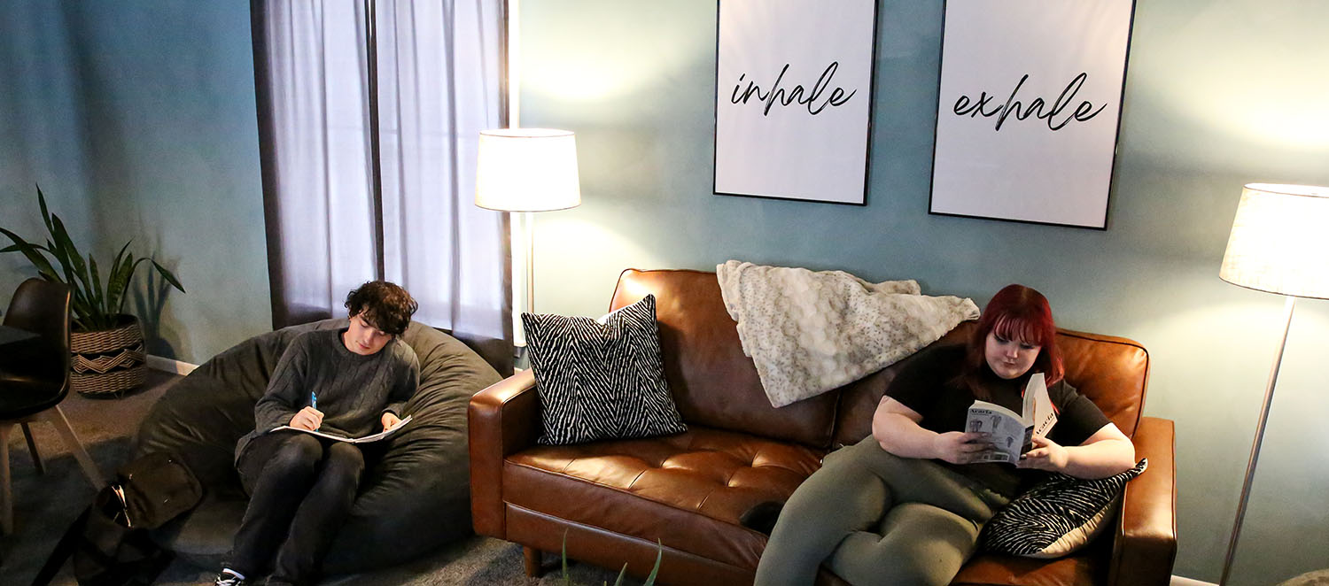 students in the Living Room in Ebersole Health and Wellness Center